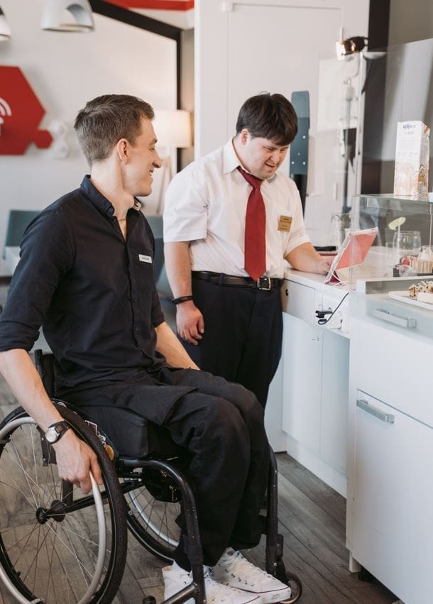 Disability Rights in Israel - Two men with different disabilities working